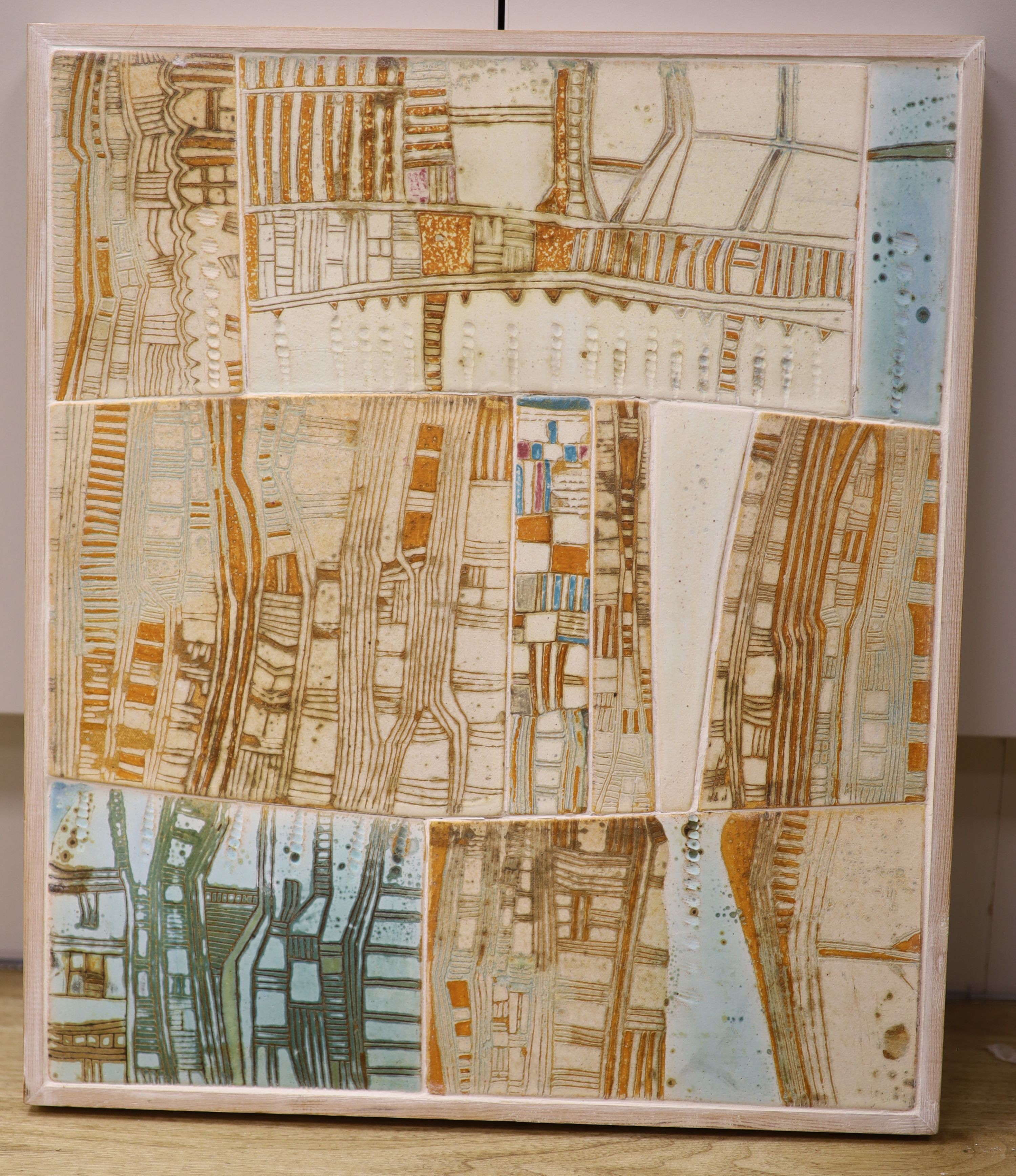 Linda John, 'Urbane Landscape', stoneware tiles with incised decoration in pale blue, brown and orange, Gallery on The Green label verso, signed and dated '98 verso, 44cm x 38cm